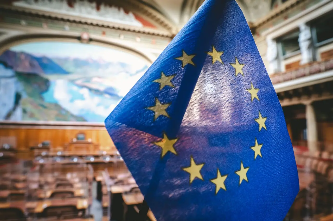 Close-up of the European Union flag inside the Swiss Parliament's National Council chamber in Bern. Close-up of the European Union flag inside the Swiss Parliament’s National Council chamber in Bern.
