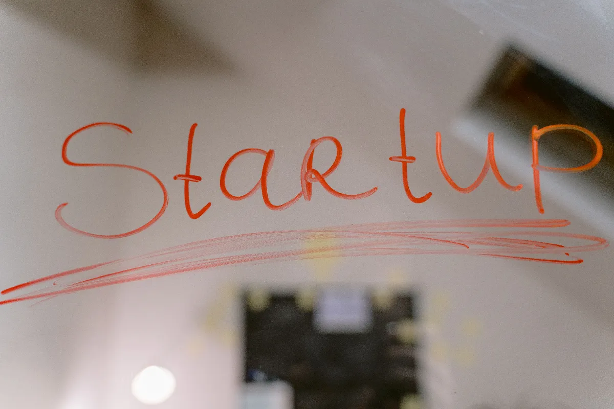 Conceptual image of startup text written on a mirror, symbolizing innovation and new beginnings. Conceptual image of startup text written on a mirror, symbolizing innovation and new beginnings.